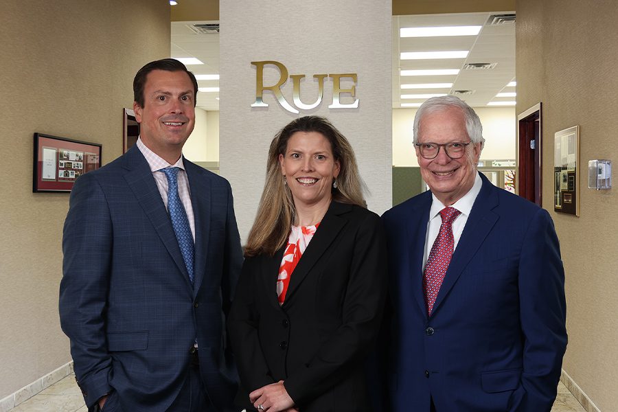 Meet Our Team - Portrait Photo of Three Members of the Rue Insurance Team